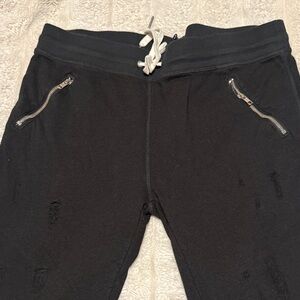 n:PHILANTHROPY Black Sweatpants with Red Logo Tag